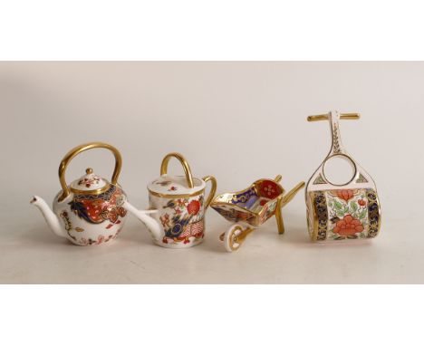 A Royal Crown Derby Imari miniature model garden roller together with Watering Can, Wheelbarrow and Kettle, first quality (4)