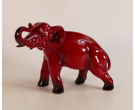 Royal Doulton Flambe model of an elephant with trunk in salute, h.14cm. 