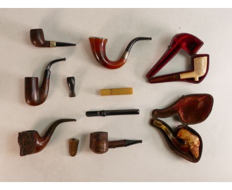 A Collection of eight pipes and Cheroot holders to include Black Forest Bear, Silver Collared Meerschaum Pipe moulded as an E
