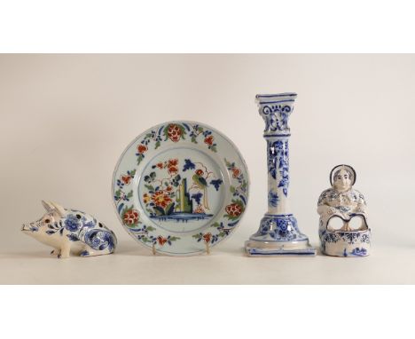 A small group of tin-glazed Delftware to include 18th century Lambeth style plate, 19th century candlestick, A Pig Tulip Frog