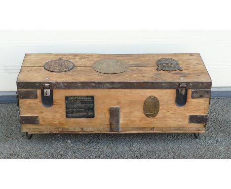 A 20th century banded tool chest with three salvaged safe plates added to top and four legs to the base. Height: 39cm Length: