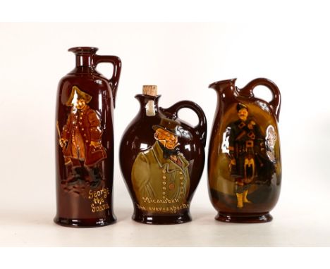 Three Royal Doulton Kings ware Dewars Scotch Whisky decanters. One with stopper and broken label. Height of tallest: 25.4cm (