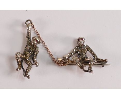 Silver unusual marcasite brooch as a seated monkey with another swinging monkey from chain, c1930s. 