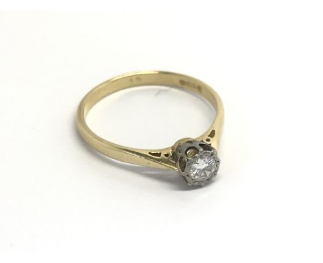 An 18carat gold diamond solitaire ring. 0.20 of a carat ring size P