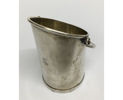 A novelty French silver table vesta in the form of a milk pail, etched date 1909. H.7cm.