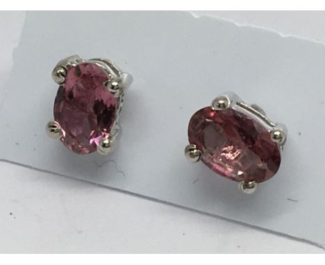 A pair of pink tourmaline studs in silver