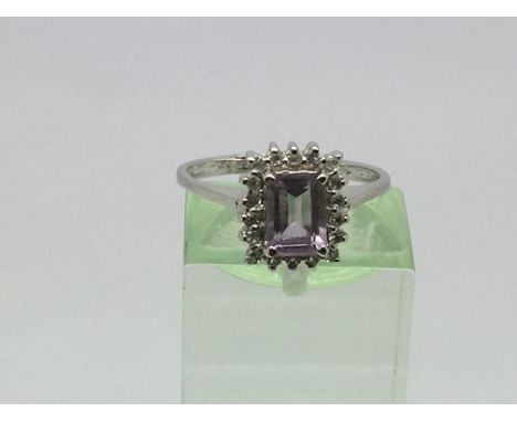 A 9ct white gold ring set with an amethyst, approx 2.6g and approx size N.