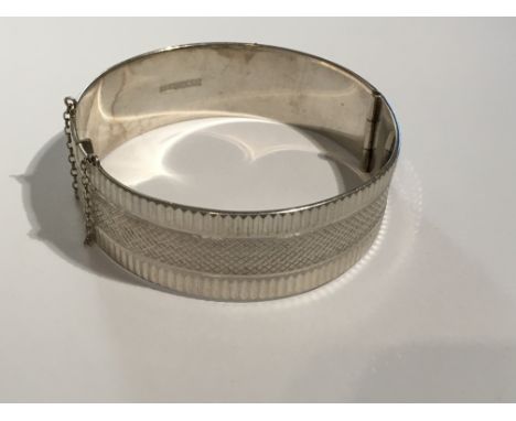 A heavy hallmarked silver bangle. Approx 42g.