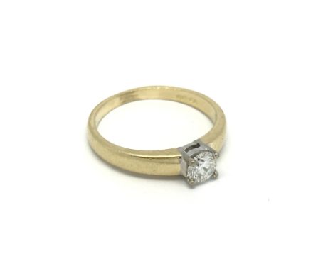 An 18carat yellow gold brilliant cut diamond solitaire ring the diamond 0.30 of a carat and of good colour F-G colour and goo