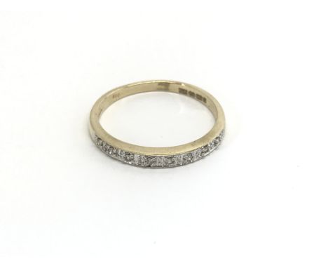 A 9carat gold half hoop eternity ring size N