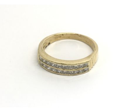 A Quality 18carat gold ring set with two rows of diamonds ring size N.