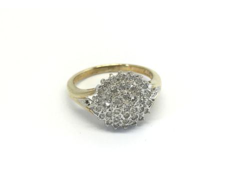 A 9carat gold diamond cluster ring size N