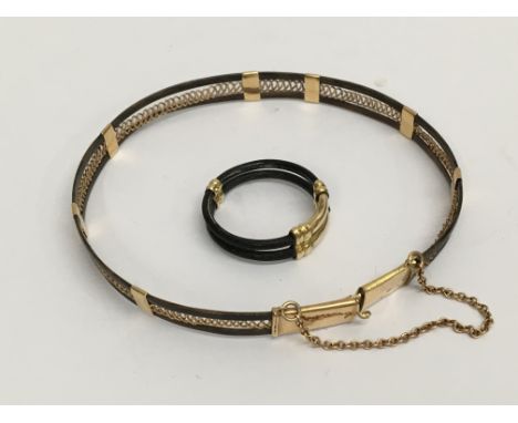 An antique woven elephant hair and yellow metal mounted bangle and similar ring (P).