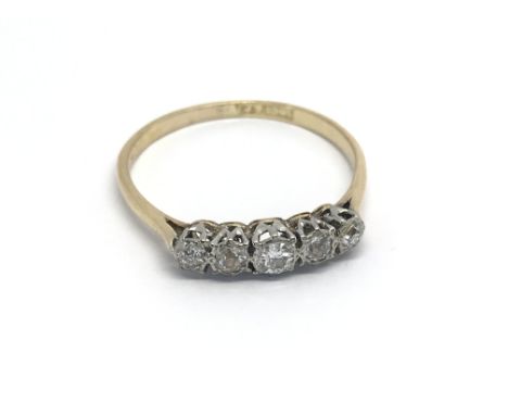 An 18carat gold ring set with five diamonds 0.20 of a carat ring size U-V