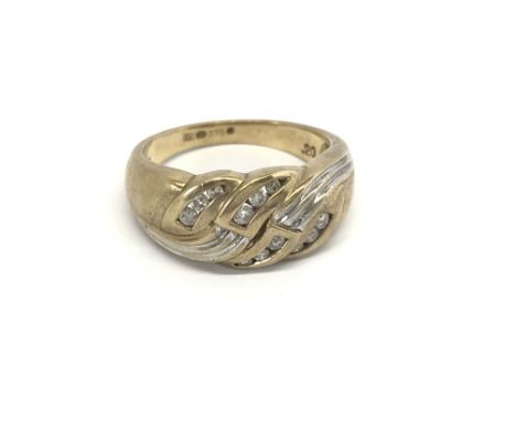 A 9carat gold ring set with a pattern of diamonds ring size N