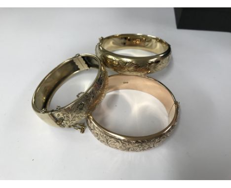 3 hallmarked silver gilt bangles.