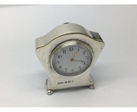 A miniature hallmarked silver clock, marks for Birmingham 1905, Henry Wilkinson Ltd.