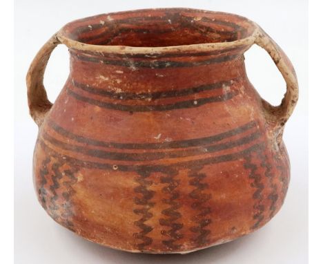 A Neolithic period vessel, having twin incorporated handles and retaining much of its original polychrome decoration, D: 12 c
