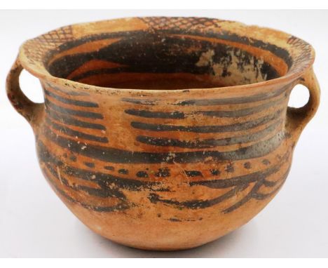 A Neolithic period terracotta pot, with flared rim and two loop handles; the body and rim interior painted with geometric mot