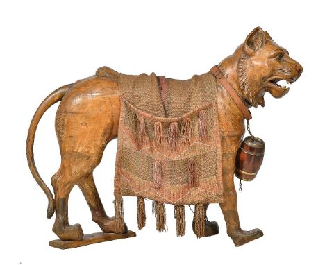 A Continental carved and stained wood model of a tiger, possibly a fairground prop, early 20th century, modelled as standing 