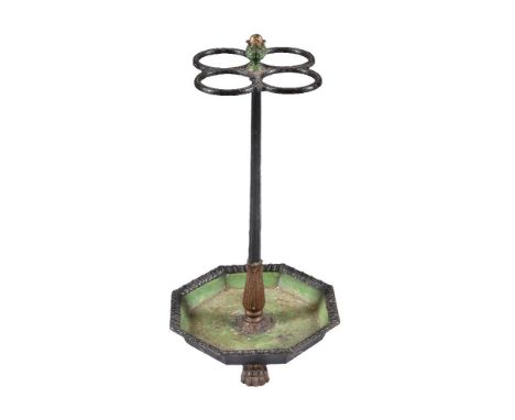 A Victorian painted cast iron stick and umbrella stand, last quarter 19th century, the foliate cast finial above four conjoin