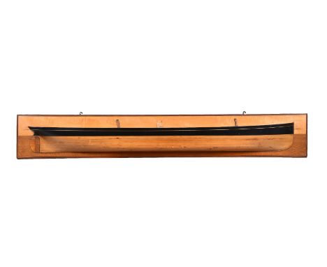 A half block model of the steamship Glamis Castle, with funnel and twin truncated masts, the rectangular satinwood veneered s