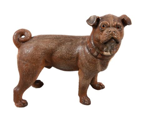 An Austrian painted terracotta model of a standing pug, early 20th century, portrayed with head turned to dexter, with inset 