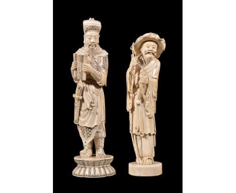 ϒTwo Chinese ivory figures, Qing Dynasty, circa 1880-1900, both standing, one holding a scroll and the other with gnarled sta