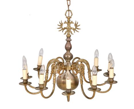 A pair of brass ten light chandeliers in German 18th century style, second half 20th century, the urn sockets and circular dr