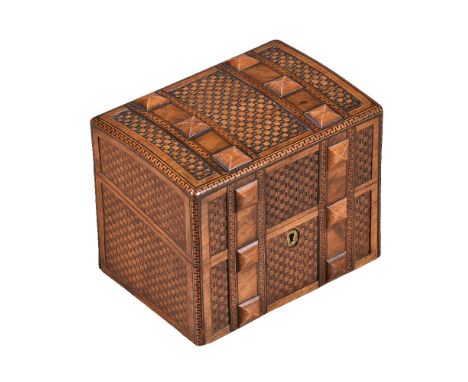 A carved walnut tea caddy, probably Continental, circa 1900, of rectangular form and loosely modelled as a trunk, the exterio