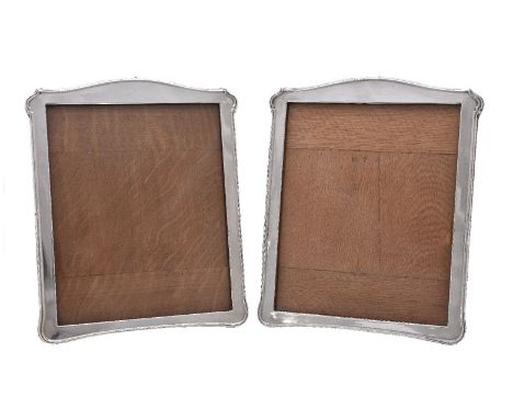 A pair of silver photograph frames, by A. &amp; J. Zimmerman Ltd, Birmingham 1916, and by James Deakin &amp; Sons, Chester 19