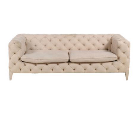 A button upholstered sofa, of recent manufacture, with two removable seat cushions, 71cm high, 210cm wide, 90cm deep, and an 