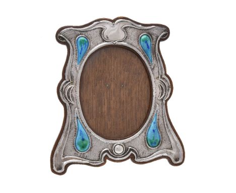 An Arts and Crafts silver and enamel photograph frame by Deakin &amp; Francis, Birmingham 1903, shaped tapered rectangular, e