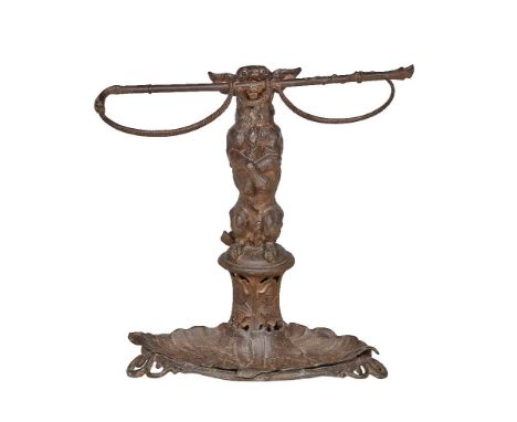 A Victorian Coalbrookdale cast iron stick stand, last quarter 19th century, modelled as a begging dog on its hind legs, the w