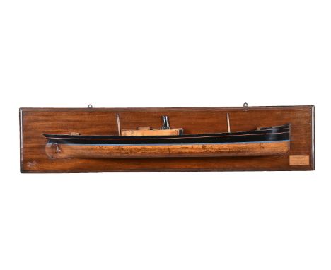 A half block model of the S.S. Maria A Hinde, 20th century, with funnel and twin truncated masts, a painted plaque to the rec