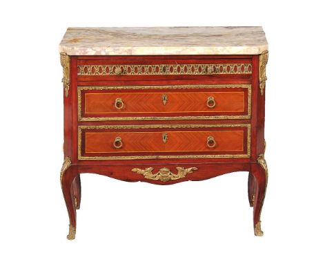 ϒ  A mahogany, Kingwood, and gilt metal mounted commode in Louis XVI style, circa 1900, with marble top 80cm high, 83cm wide,