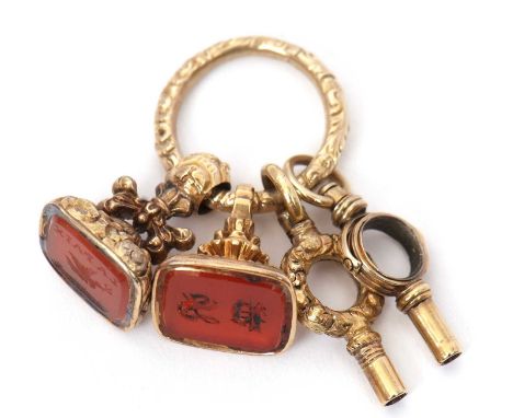 Two fobs and watch keys, both fobs set with carnelian intaglio, each approx. 16mm long, on repousse decorative ring set with 
