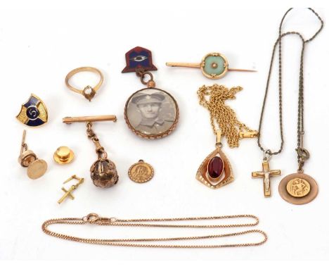 A mixed lot of gold and yellow metal jewellery: to include an unmarked Masonic ball charm; a red stone pendant stamped 375 on
