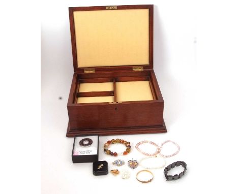 A mahogany inlaid jewellery box and contents, to include cultured pearl bracelets, hematite bracelet, rolled gold bangle, Mac