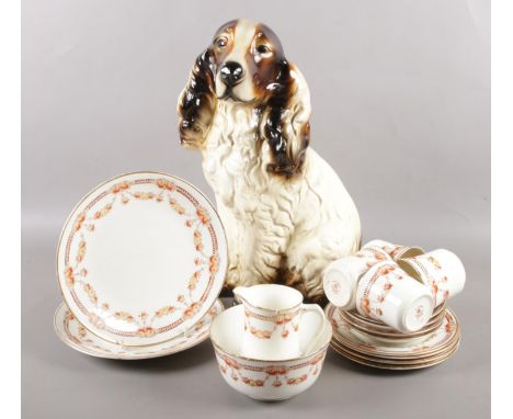 A Royal Albert bone china part tea set along with a vintage plaster figure of a spaniel.  