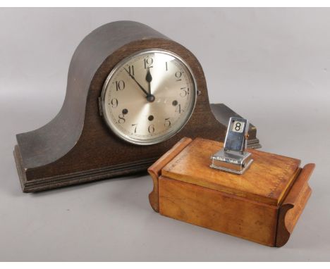 A Haller Westminster chime mantel clock, along with a vintage cigarette dispenser with calendar.  