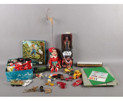 A selection of vintage toys. To include a tin of Lego, die-cast vehicles Corgi Citroen DS19, Volvo P.1800, wooden puppet, and