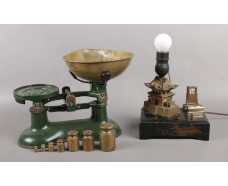 A set of Boots, Nottingham weighing scales, with seven weights, accompanied by an Oriental desk calendar and light.  