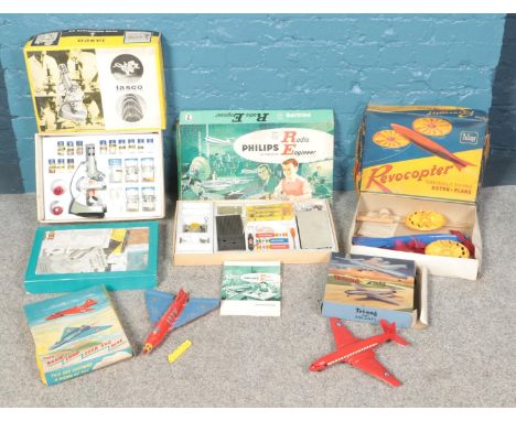 A collection of vintage toys. Including Philips Radio Engineer kit, Tri-ang Minic Aircraft, Microscope kit, etc.  