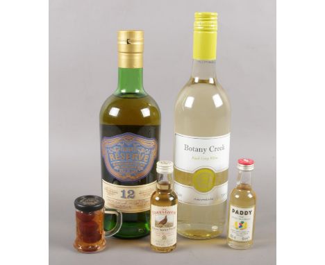 A collection of sealed alcohol. Includes Irish Whiskey, Scotch Whisky, white wine etc.  