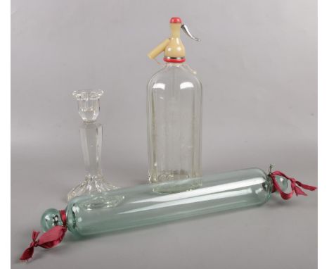 A quantity of glassware. Vintage glass soda syphon by Ward &amp; Sons Swinton, vintage glass rolling pin, candlestick.  