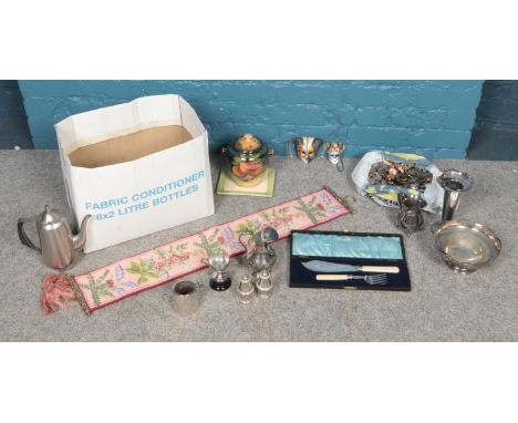 A box of mostly metalwares and silver plated tourist spoons. To include vases, a large collection of various tourist spoons, 