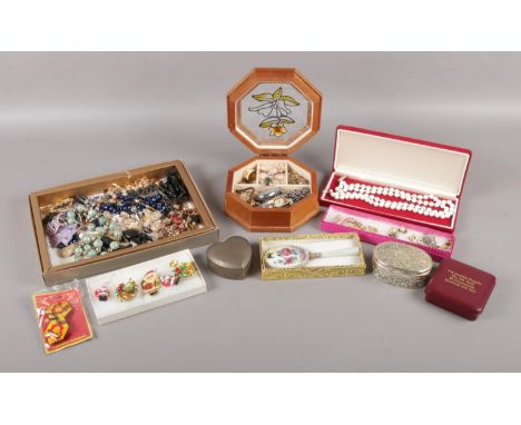 A variety of costume jewellery; to include an oriental hand mirror, necklaces, manual wristwatches and jewellery boxes.  