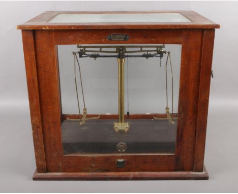 A cased set of George &amp; Becker chemical scales. Case Griffin &amp; George Ltd.  