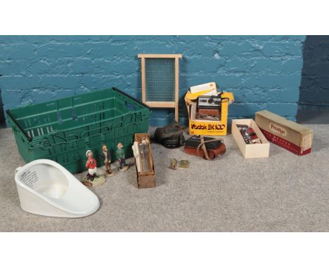 A box of miscellaneous. Comprising of a boxed Kodak EK100 instant camera, a boxed Prestige egg whisk, a slipper bed pan, a Zi